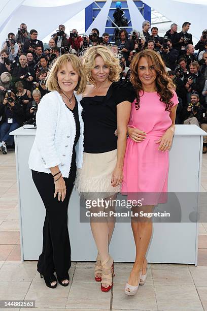 Actresses Susse Wold, Anne Louise Hassing and Alexandra Rapaport pose at the "Jagten" Photocall during the 65th Annual Cannes Film Festival at Palais...