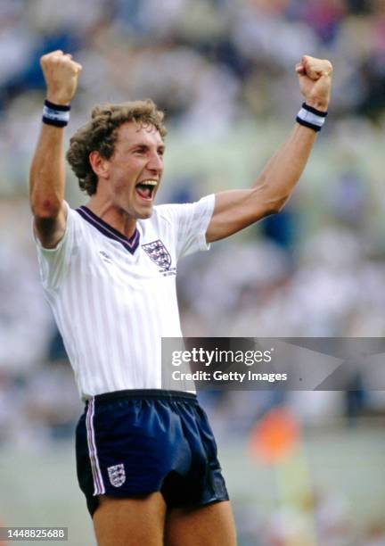 England player Terry Butcher wearing wrist bands celebrates after England beat Poland in the 1986 FIFA World Cup group match at the Universitario...