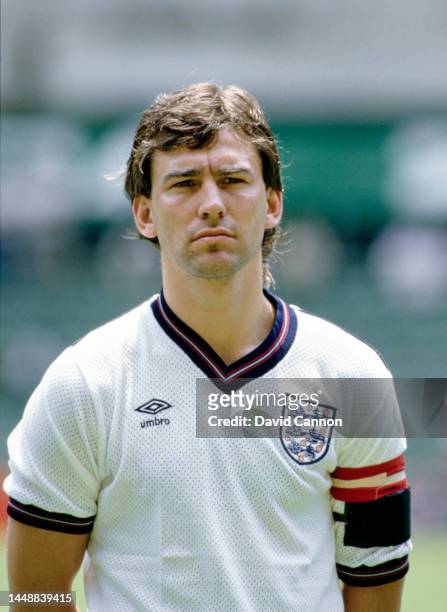 England captain Bryan Robson lines up before a game against Italy wearing a mesh Umbro warm weather shirt, in June 1985 in Mexico.
