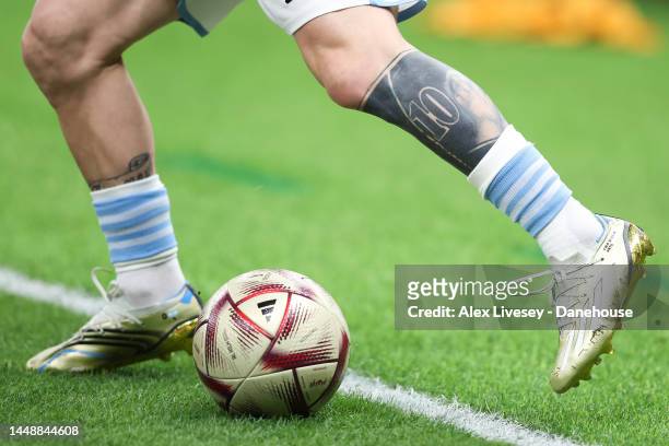 Tattoos are seen on the legs of Lionel Messi of Argentina during the FIFA World Cup Qatar 2022 semi final match between Argentina and Croatia at...