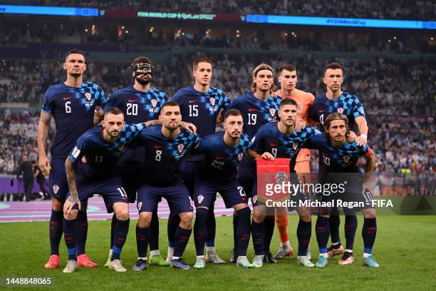 Croatia players lines up for the team photos prior to the FIFA World Cup Qatar 2022 semi final match between Argentina and Croatia at Lusail Stadium...