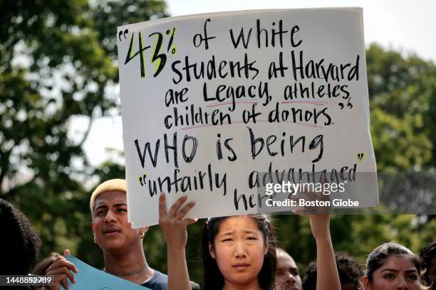 Cambridge, MA A Harvard student holds a sign during a rally protesting the Supreme Courts ruling against affirmative action.