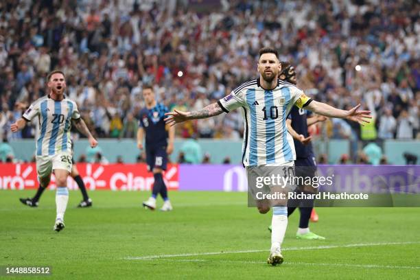 Lionel Messi of Argentina celebrates after scoring the team's first goal during the FIFA World Cup Qatar 2022 semi final match between Argentina and...