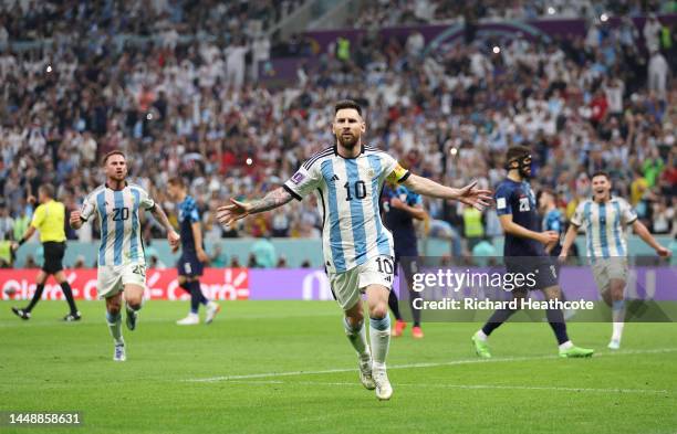 Lionel Messi of Argentina celebrates after scoring the team's first goal during the FIFA World Cup Qatar 2022 semi final match between Argentina and...