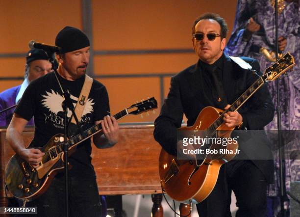 Band member The Edge performs with Elvis Costello at the Grammy Awards Show, February 8, 2006 in Los Angeles, California.