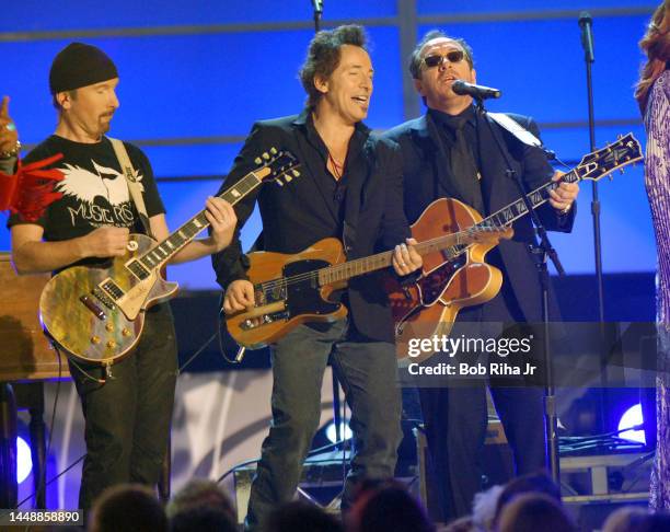 The Edge , Bruce Springsteen and Elvis Costello perform together at the Grammy Awards Show, February 8, 2006 in Los Angeles, California.