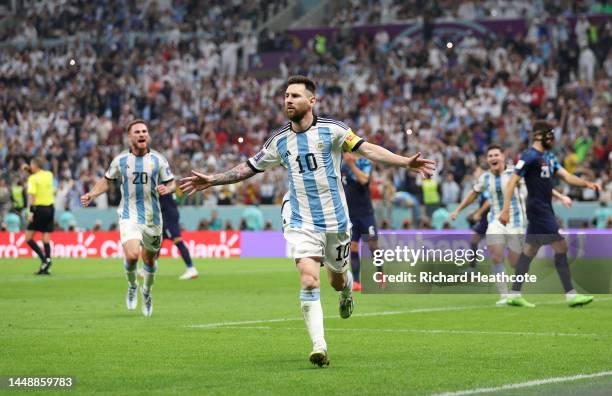 Lionel Messi of Argentina celebrates after scoring the team's first goal during the FIFA World Cup Qatar 2022 semi final match between Argentina and...