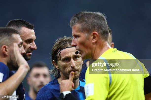 Daniele Orsato referee match and Luka Modrić of Croatia seen during the FIFA World Cup Qatar 2022 semi final match between Argentina and Croatia at...