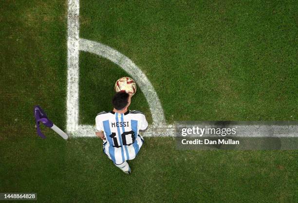 Lionel Messi of Argentina takes a corner kick during the FIFA World Cup Qatar 2022 semi final match between Argentina and Croatia at Lusail Stadium...