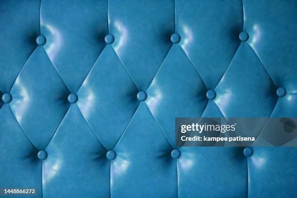 full frame shot of blue leather sofa - cushion texture stock pictures, royalty-free photos & images