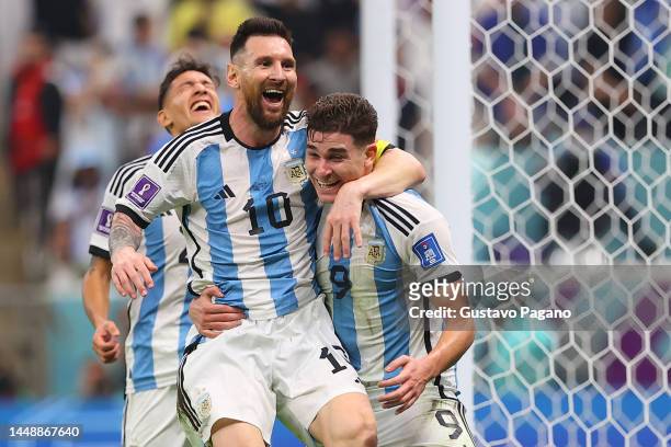 Lionel Messi and Julian Álvarez of Argentina celebrates after scoring the second goal of their team during the FIFA World Cup Qatar 2022 semi final...