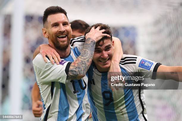 Lionel Messi and Julian Álvarez of Argentina celebrates after scoring the second goal of their team during the FIFA World Cup Qatar 2022 semi final...