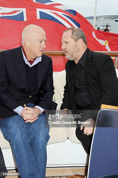Bryan Lourd and Harvey Weinstein attend a lunch hosted by Len Blavatnik, Harvey Weinstein and Warner Music during the 65th Cannes Film Festival on...