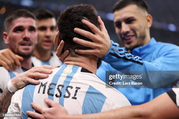 Lionel Messi celebrates after their sides third goal by Julian Alvarez of Argentina during the FIFA World Cup Qatar 2022 semi final match between...