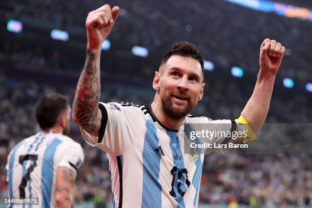 Lionel Messi celebrates after their sides third goal by Julian Alvarez of Argentina during the FIFA World Cup Qatar 2022 semi final match between...