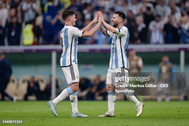 Lionel Messi of Argentina celebrates with Julian Alvarez of Argentina his team's second goal during the FIFA World Cup Qatar 2022 semi final match...