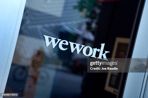 An entranceway door to a WeWork office building on December 13, 2022 in Miami, Florida. WeWork Inc. Is reported to be close to default as it runs low...