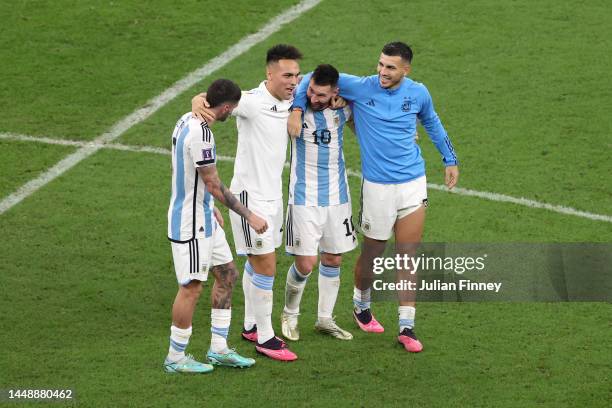 Rodrigo De Paul, Lautaro Martinez, Lionel Messi and Leandro Paredes of Argentina celebrate following their sides victory after the FIFA World Cup...