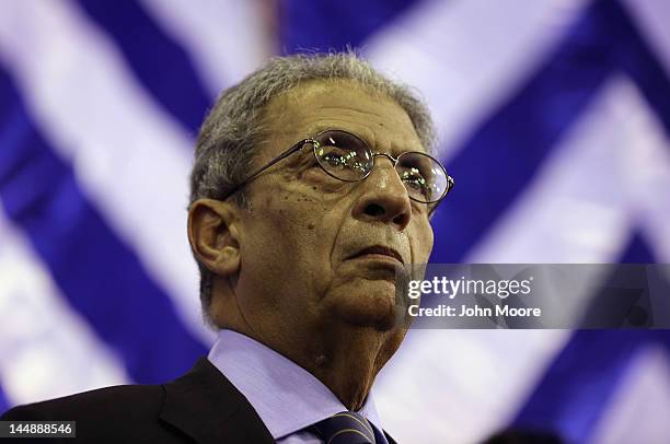 Egyptian presidential candidate Amr Moussa waits to speak on the last day of campaigning on May 20, 2012 in Cairo, Egypt. A Foreign Minister under...