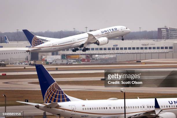 United Airlines flight lifts off at O'Hare International Airport on December 13, 2022 in Chicago, Illinois. United Airlines said that it has placed...