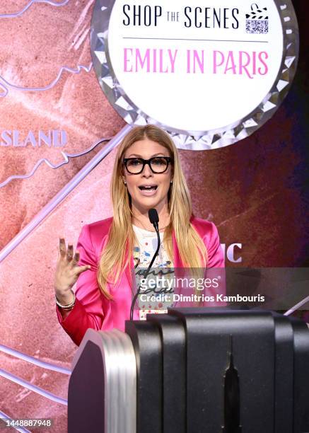 Jill Martin speaks as the Emily in Paris Cast visits The Empire State Building on December 13, 2022 in New York City.