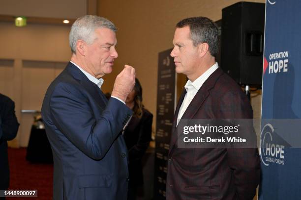 Ares Management Co-Founder & Executive Chairman Tony Ressler and Walmart President & CEO Doug McMillon attend the 9th Annual HOPE Global Forums at...