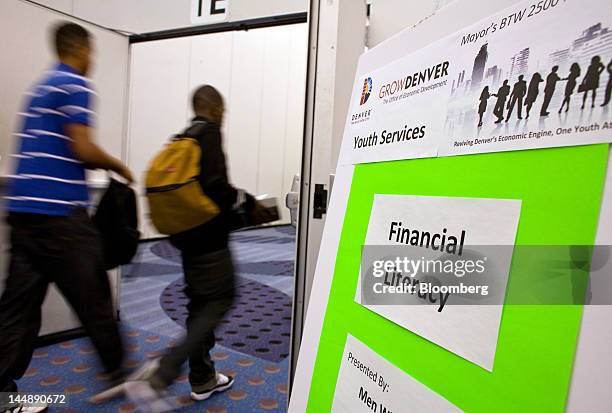 Participants enter a Financial Literacy training session at The Summer Youth Jobs & Training Expo 2012 at the Colorado Convention Center in Denver,...