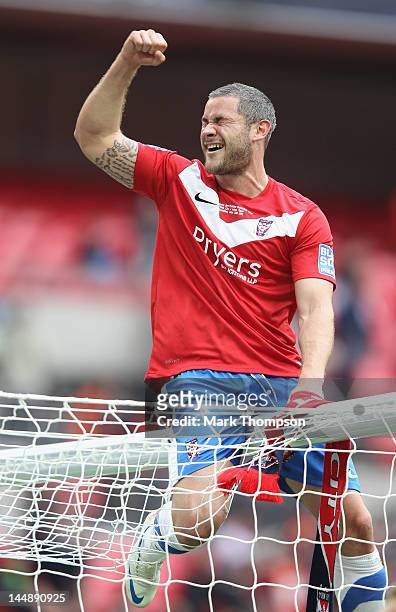 Jamie Reed of York City celebrates promotion to the football league during the Blue Square Bet Premier League Play Off Final at Wembley Stadium on...