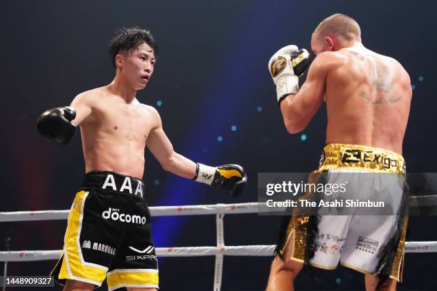 Naoya Inoue of Japan gestures to Paul Butler of Great Britain in the 7th round during the IBF, WBA, WBC and WBO Bantamweight Title Bout at Ariake...