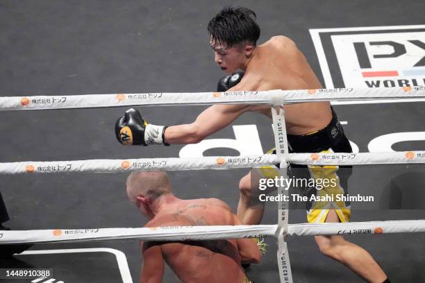 Naoya Inoue of Japan knocks out Paul Butler of Great Britain in the 11th round during the IBF, WBA, WBC and WBO Bantamweight Title Bout at Ariake...