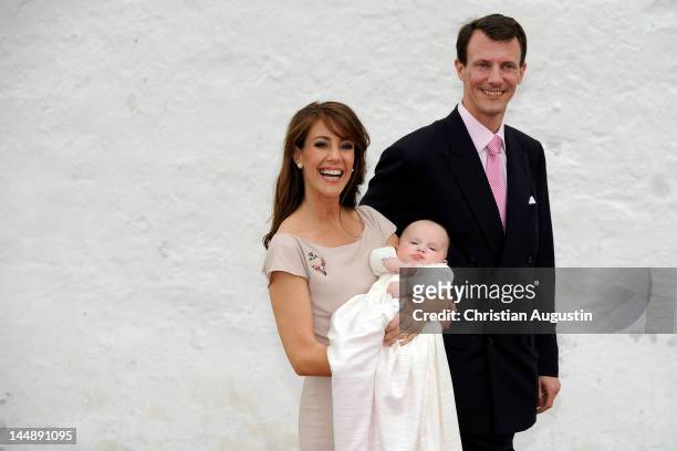 Princess Marie of Denmark, Prince Joachim of Denmark and Princess Athena of Denmark attend the christening of Princess Athena of Denmark at the...