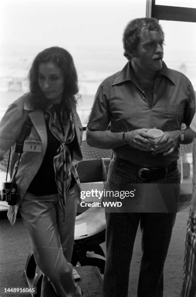 Ina Balin and John Stephens attend the California 500 Race at the Ontario Speedway in Ontario, California, on September 2, 1972.