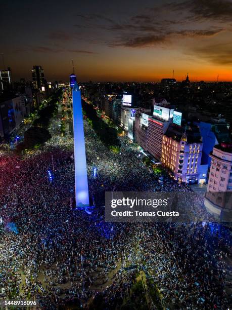 Aerial view as Argentine fans gather to celebrate at the Obelisk after their team's victory in the semi-final match of FIFA World Cup Qatar 2022...