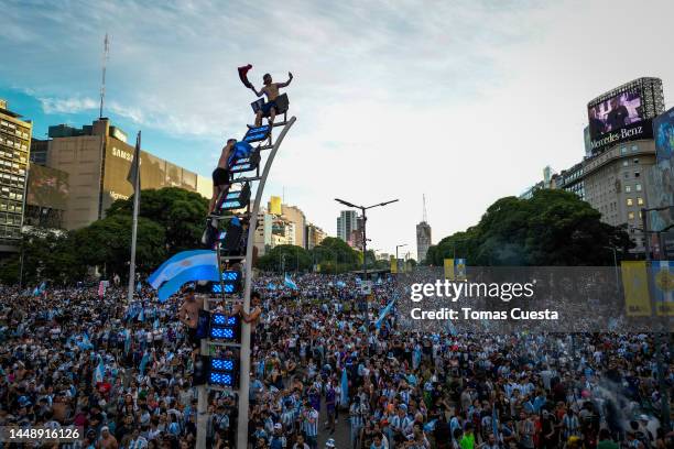 Fans of Argentina celebrate at the Obelisk after their team's victory in the semi-final match of FIFA World Cup Qatar 2022 between Argentina and...