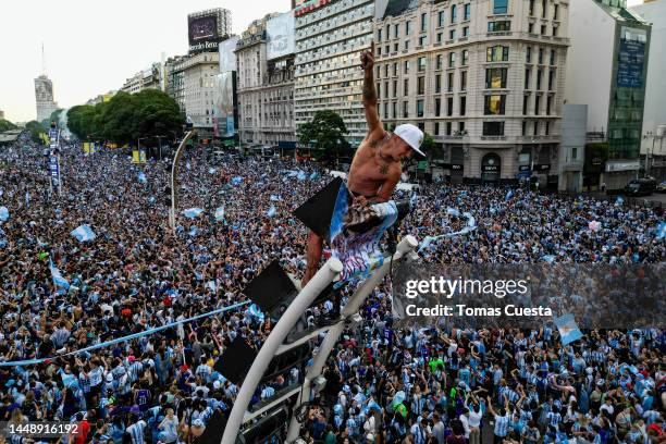 Aerial view as Argentine fans gather to celebrate at the Obelisk after their team's victory in the semi-final match of FIFA World Cup Qatar 2022...