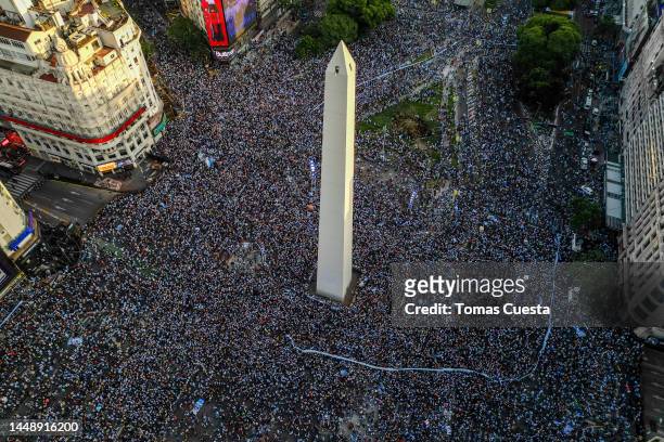 Aerial view as Argentine fans gather to celebrate at the Obelisk after their team's victory in the semi-final match of FIFA World Cup Qatar 2022...