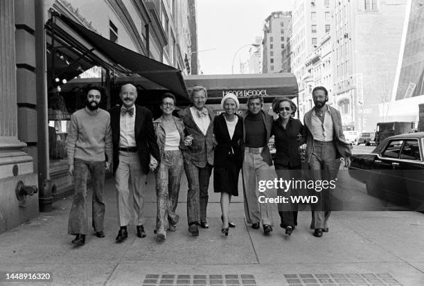 Designers Don Kline, Lee Bailey, Viola Sylbert, Dick Huebner, Ralph Lauren, Holly Harp, and Carlos Falchi and Bendel's president Geraldine Stutz pose...