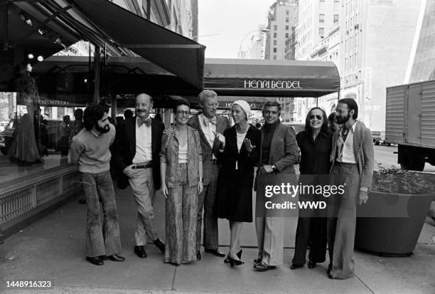 Designers Don Kline, Lee Bailey, Viola Sylbert, Dick Huebner, Ralph Lauren, Holly Harp, and Carlos Falchi and Bendel's president Geraldine Stutz pose...