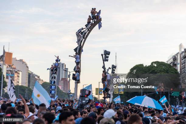 Fans of Argentina celebrate at the Obelisk after their team's victory in the semi-final match of FIFA World Cup Qatar 2022 between Argentina and...