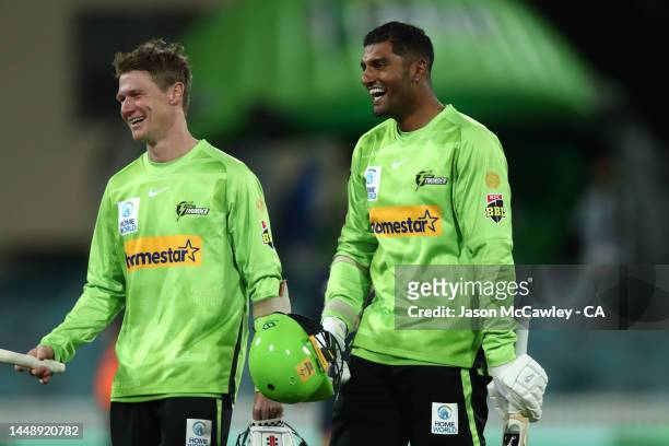 Brendan Doggett and Gurinder Sandhu of the Thunder celebrate victory during the Men's Big Bash League match between the Sydney Thunder and the...