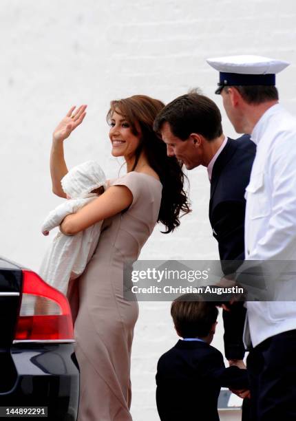 Princess Marie of Denmark, Prince Joachim of Denmark, Prince Hendrik of Denmark and Princess Athena of Denmark attend the christening of Princess...