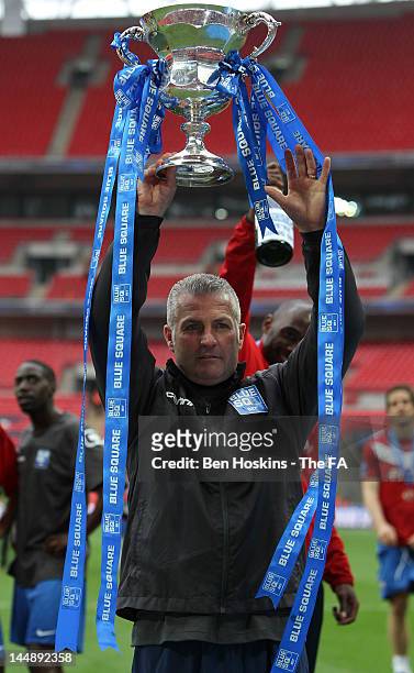 York manager Gary Mills celebrates with the trophy after the Blue Square Bet Premier League Play Off Final between Luton Town and York City at...
