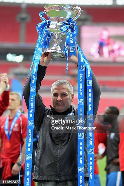 Gary Mills the manager of York City celebrates promotion to the football league during the Blue Square Bet Premier League Play Off Final at Wembley...
