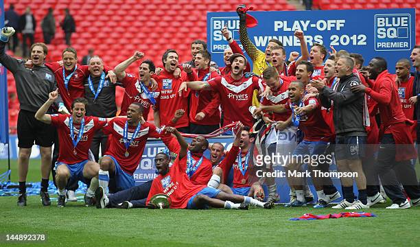 The players of of York City celebrate promotion to the football league during the Blue Square Bet Premier League Play Off Final at Wembley Stadium on...