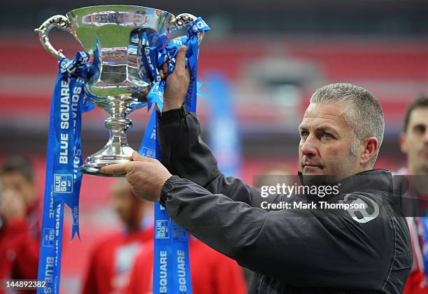 Gary Mills the manager of York City celebrates promotion to the football league during the Blue Square Bet Premier League Play Off Final at Wembley...