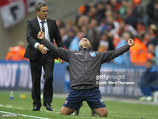 Gary Mills the manager of York City celebrates promotion to the football league during the Blue Square Bet Premier League Play Off Final at Wembley...