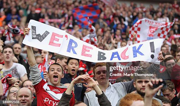 York City supporters celebrate promotion to the football league during the Blue Square Bet Premier League Play Off Final at Wembley Stadium on May...