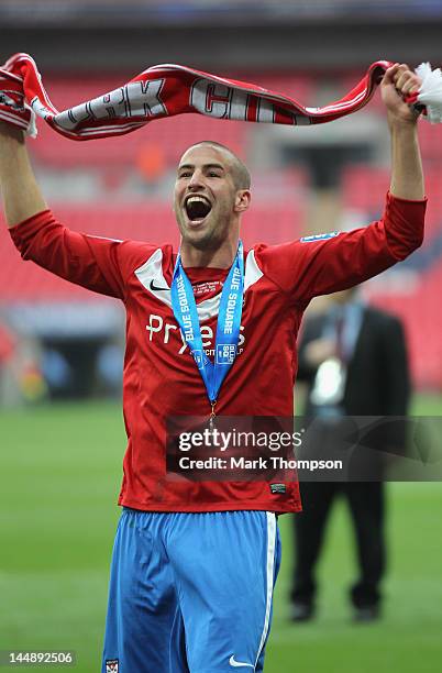 Matty Blair of York City celebrates promotion to the football league during the Blue Square Bet Premier League Play Off Final at Wembley Stadium on...