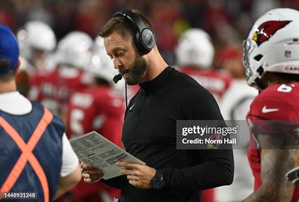 Head coach Kliff Kingsbury of the Arizona Cardinals prepares for a game against the New England Patriots at State Farm Stadium on December 12, 2022...