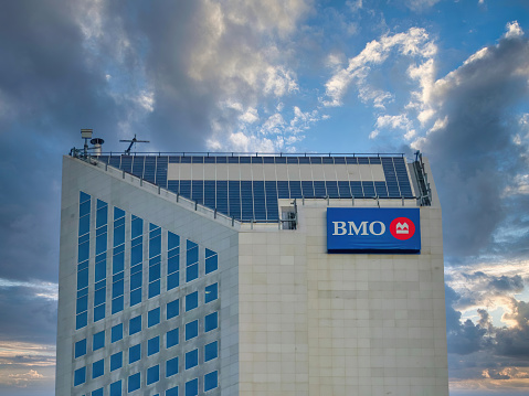 Dec 10, 2022. Calgary, Alberta, Canada. A BMO sign on top of a building in downtown Calgary.